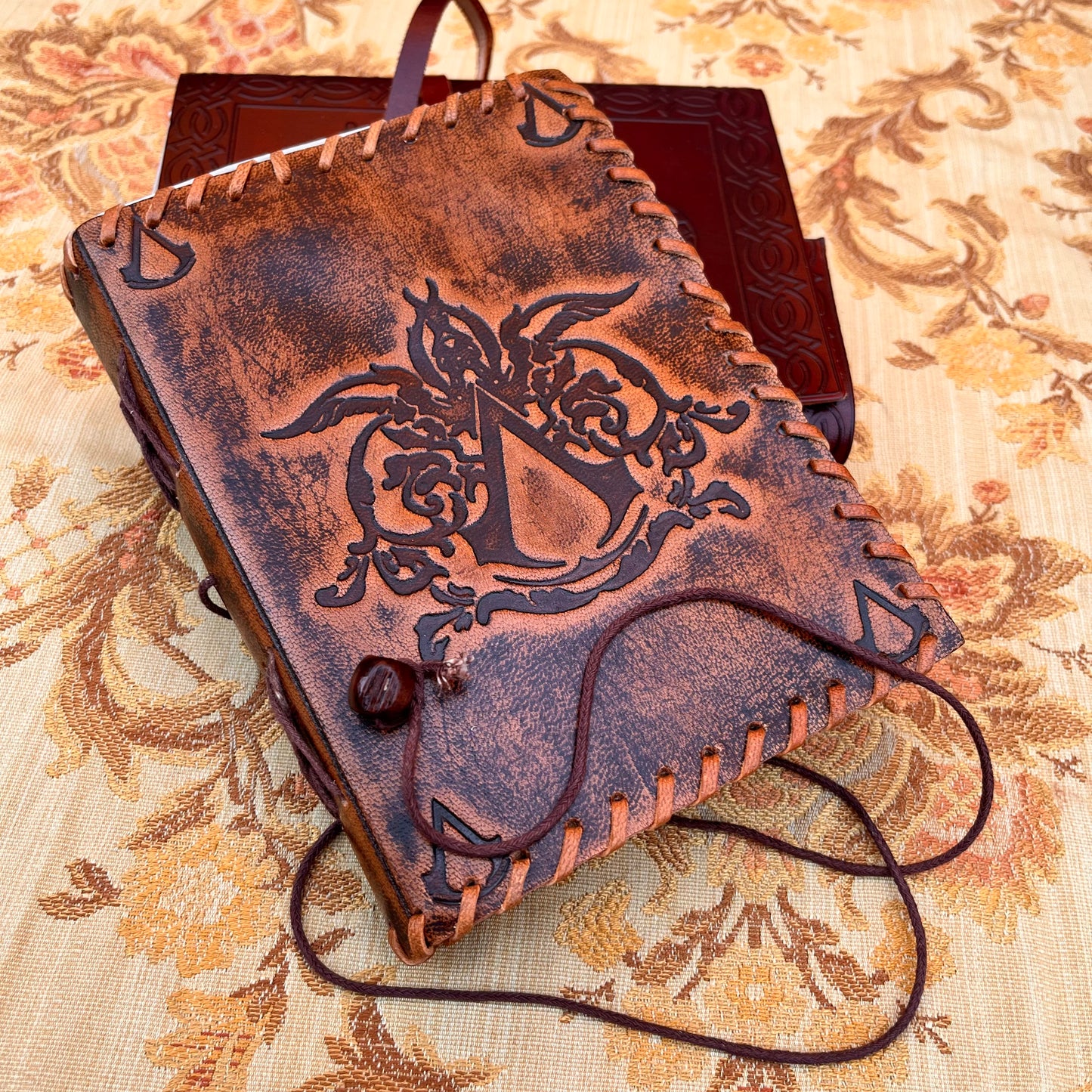 Leather Sketchbook with Embossed Assassin's Creed Design